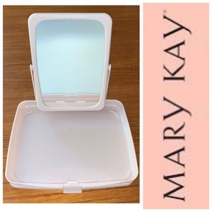 Mary Kay pink plastic compact travel mirror.